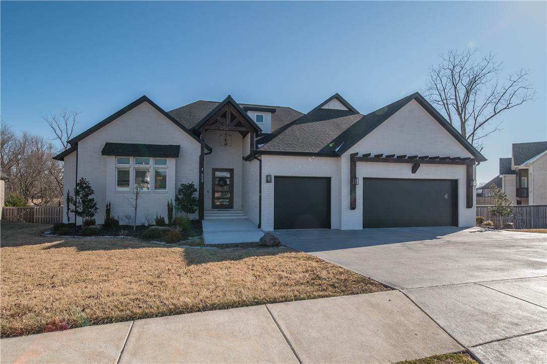 This home is just what you've been waiting for! Gourmet kitchen with large quartz island, custom cabinetry, commercial-style fridge, 5 burner gas range, double ovens and large pantry. Laundry rooms on both levels. Living, dining, office, half bath and master suite on main level. Walkout basement has large bonus/game room, three bedrooms, two full baths and a second laundry room. 2 covered outdoor spaces can be accessed upstairs and down. Awesome fire pit in the back yard that makes for a great gathering spot.  Highly sought after Oak Tree community offers resort style pool, tennis, fitness center, playground and clubhouse.  Don't miss out in this opportunity to enjoy all this home has to offer.
