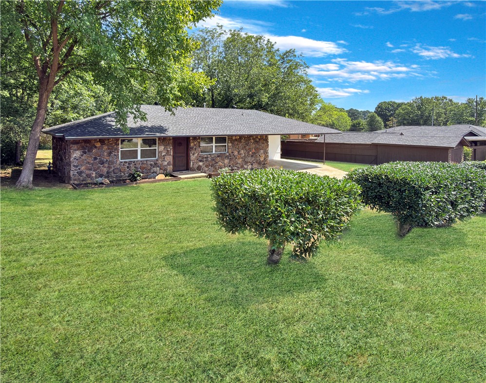 Move-in ready and fully renovated this 3-bedroom, 2-bath home Atkins offers approximately 1,400 square feet of refreshed living space. Located just half a mile from I-40, enjoy easy travel access. New flooring throughout was installed in 2026, while the kitchen showcases granite countertops. Marble countertops add an elegant finish to the primary bathroom. Major improvements offer peace of mind, including a roof installed in 2023, HVAC system and sewer updates completed in 2025, plus a new water heater and gas line installed in 2026. The practical floor plan features generous living and kitchen areas with room to gather, relax, and entertain. Outside, the backyard offers a welcome sense of privacy that is a rare find in a subdivision, creating an ideal setting for peaceful mornings, outdoor dining, play, pets, or weekend get-togethers. With extensive renovations, stylish finishes, and convenient interstate access, this Atkins home is ready for its next chapter. Schedule your private showing today!