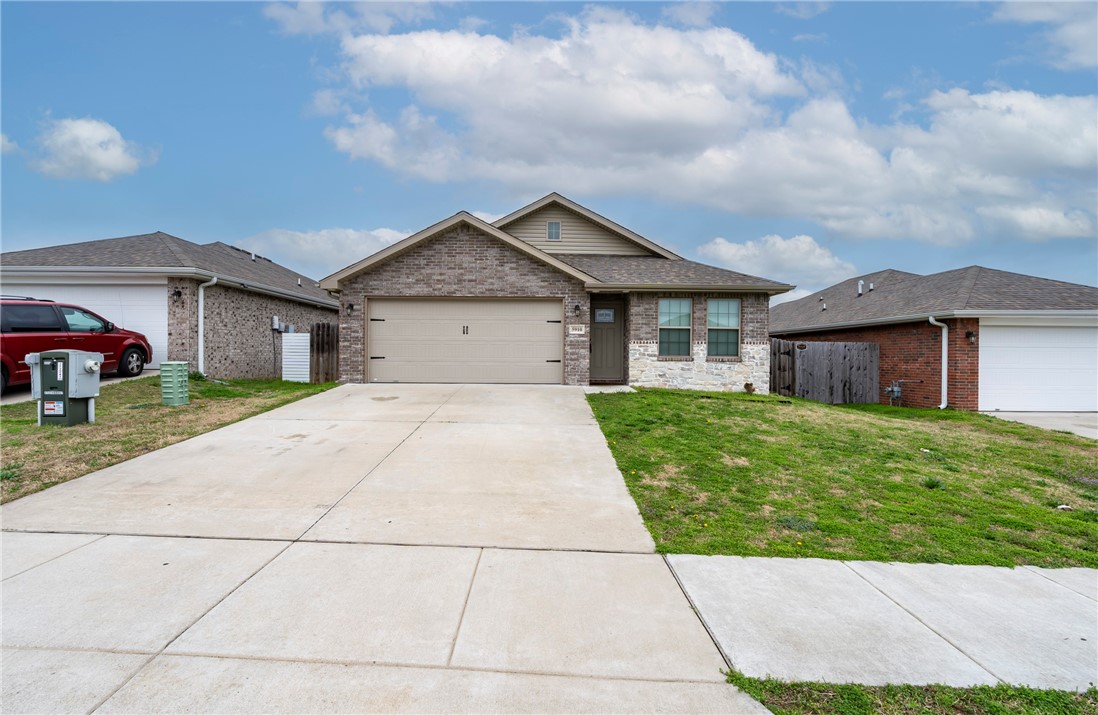4 Bed 2 Bath all-brick home located on the outskirts of Bentonville. The entire interior of the home was just freshly painted making it move in ready. Designed with comfort and functionality in mind, this home features an open floor plan with a spacious living area highlighted by a cathedral ceiling, creating a bright and inviting atmosphere. The kitchen is perfect for everyday living and entertaining, offering granite countertops, LED lighting, a pantry for extra storage, and attractive wood-look ceramic tile flooring that combines durability with style. Blinds throughout the home provide convenience and privacy. The primary suite includes a walk-in closet and double sinks giving you plenty of room for storage and organization. Step outside to enjoy the privacy-fenced backyard, ideal for relaxing, pets, or outdoor gatherings. With its all-brick exterior, modern finishes, and desirable Bentonville location, this home offers the perfect blend of style, comfort, and convenience.