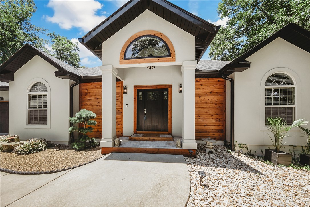 Bike-In. Bike-Out. Bella Vista Living. Welcome to 32 Attleborough Lane, where outdoor adventure meets everyday comfort. This beautifully remodeled, move-in ready home offers 2,300+ SF of heated living space plus an additional 288+ SF of conditioned flex space with dedicated HVAC, perfect for a home office, gym, studio, or hobby room. Situated on a rare, fully fenced 0.61-acre lot with direct access to the Blowing Springs Trail System, you'll enjoy mountain biking from your backyard, relaxing on the spacious new deck, and taking advantage of renovated bathrooms and numerous recent updates throughout. Conveniently located near Blowing Springs Park, OZ Trails Bike Park, Allen's Foods, dining, shopping, and just minutes from Bentonville, this home offers the perfect combination of privacy, trail access, and the Northwest Arkansas lifestyle.