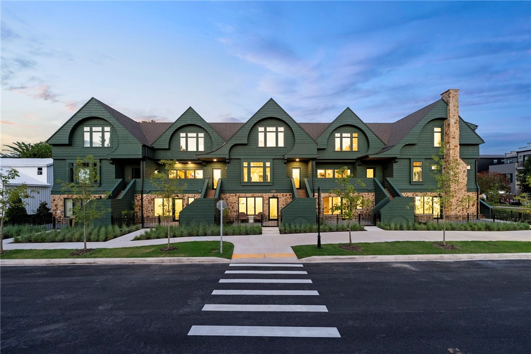 Welcome to Orchard Trailside, Bentonville’s most esteemed luxury townhome community. An urbanist’s hub in the thriving downtown scene, the property features a fresh and modern reimagining of the Craftsman Revival style. Features incredible amenities, including a whole home water filtration system, air quality scrubber, luxurious finishes, and a versatile mother-in-law suite. Enjoy smart home convenience with controlled cameras, locks, and more, making everyday living both comfortable and modern! This upscale nine-unit enclave blends solid, high-quality architectural features and natural elements with intentionally curated, sleek finishes. Living is easy here with immediate, out the-door access to the Downtown Trail and the nearby Razorback Greenway. Units feature a simple yet refined aesthetic that exudes character, warmth, functionality, and a distinct urban-meets-artisan vibe.