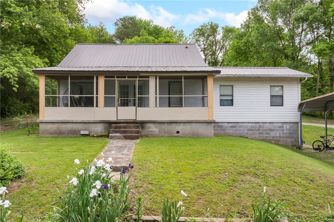 Charming and versatile, this 3-bedroom, 2-bath home in Harrison, AR offers the perfect blend of comfort, space, and functionality. Situated on a rare double lot, the property provides plenty of room to spread out—whether you’re dreaming of a garden, outdoor entertaining area, or simply extra privacy. Inside, you’ll find a well-designed layout with spacious living areas, a practical kitchen, and comfortable bedrooms suited for family living or hosting guests. One of the standout features is the detached shop with electricity—ideal for hobbies, storage, a workshop, or even a small business setup. With ample parking and room for equipment, it’s a valuable addition you won’t find everywhere. Located in a quiet, convenient area of Harrison, this property offers small-town charm with easy access to local amenities, schools, and outdoor recreation. Whether you’re looking for your first home, room to grow, or a property with workspace potential, this one checks all the boxes.