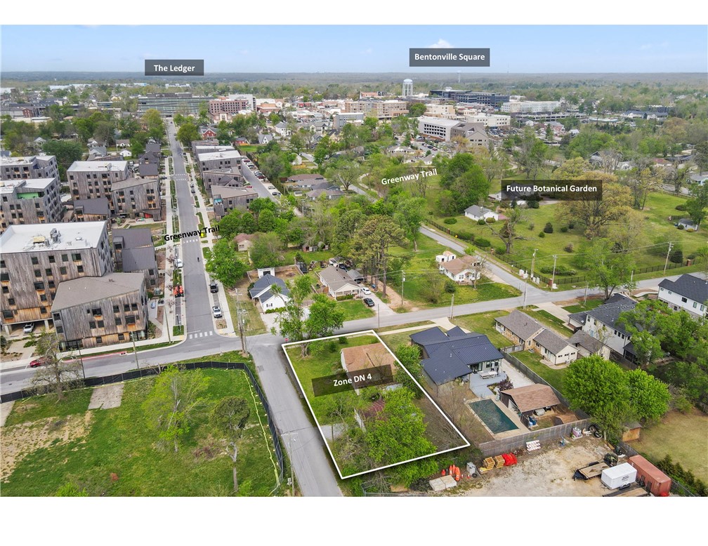 Come build your dream home. This is the location you've been waiting for. A rare opportunity to own a coveted corner lot in the heart of downtown Bentonville. Located at SE F and 3rd, with access to the Razorback Greenway, it's a short walk or bike ride away from all that downtown living has to offer. The Momentary is visible from your front porch; you have quick access to 8th Street Market, the downtown square, Walmart Home Office, and a future botanical garden across the street. Currently zoned as DN-4, this property has all the potential for a luxury home or townhome project. If you dream of downtown living, this is your chance to make it a reality. Also listed as residential. MLS #1342840.