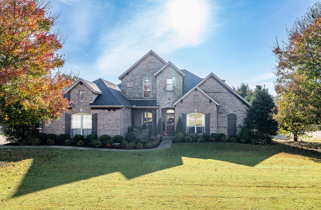 Welcome to this exceptional 5-bedroom, 3.5-bath home on a 1-acre lot backing to the White River. This beautifully updated home blends timeless design with modern comfort, featuring an open-concept layout, three bedrooms on the main level, a private office, and a large bonus room. The kitchen offers quality finishes, ample storage, and river views, while the renovated primary bath provides a spa-like retreat. Expansive windows fill the living spaces with natural light and frame the stunning river backdrop. Outdoor living shines with a large deck, spacious patio, and built-in fireplace—perfect for entertaining or relaxing. A three-car garage adds convenience. The neighborhood offers over 200 acres of common area with ponds, river access, a clubhouse, and a pool—creating a private, resort-style lifestyle just minutes from town.