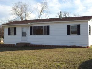 Recently remodeled cozy aluminum sided home with large fenced in yard and storage building.  New CH&A.  Would make a great first time home or rental for investor.