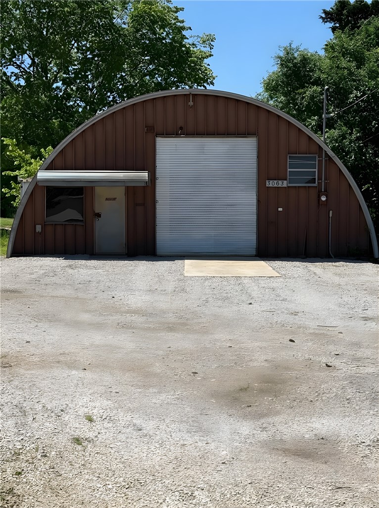 RESERVE AUCTION – COMMERCIAL & RESIDENTIAL OPPORTUNITY! Mixed-use property featuring a quonset-style shop building with roll-up door, large gravel parking area, and separate rental home in Springdale. Previously used for automotive and mechanical operations with endless potential for business, storage, investment, or redevelopment. Excellent live/work or income-producing opportunity in a high-growth area. Property will sell at auction on June 20th at 10 AM at 148 Butterfield Coach Rd./ 3063 E. Emma Ave. Successful bidder pays $5,000 deposit (cash or cashier’s check) and signs Real Estate contract on day of sale. Property closes within 30 days. Deposit credited to buyer at closing. Property sells as is, where is, with no warranties expressed or implied. Open to co-broker, only if registered with auctioneer 72 hours prior to auction. Showing by appointment only.