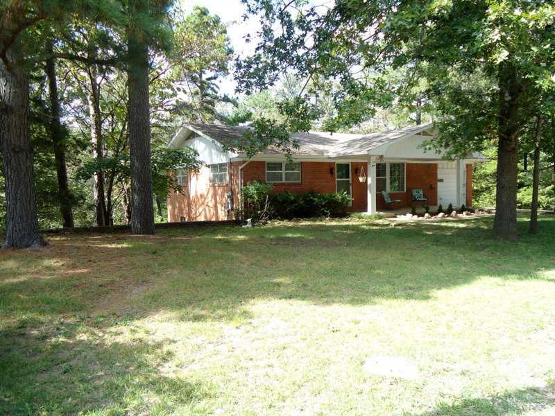 Beautifully maintained all brick home with large covered front porch. Home  totally renovated with light pleasing colors and new carpeting on upper level. Lower level has kitchen and  ceramic tile floors throughout.  Very tasteful with white wood blinds.,Offering includes this beautiful vacant lot adjacent to the house which gives  you extra parking and contains a nice garden/storage building!  A real bonus for assured privacy. This home perfect for family with extra family members--upper and lower living