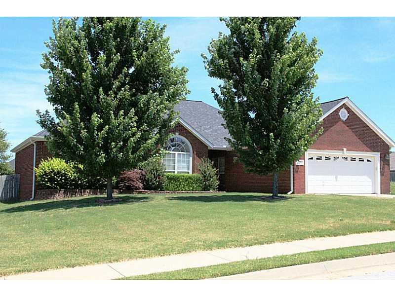 Great home in Cobblestone Place S/D. Large living room with cathedral ceiling, large master is tray ceiling and crown molding, large bedrooms with crown molding, large laundry room with sink, and more.