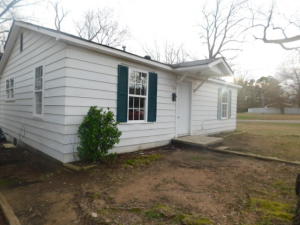 This three 3 bedroom,one bath house on a corner lot is centrally located in Atkins. The high school is one street north and US 64 is 2 blocks south . New windows throughout.