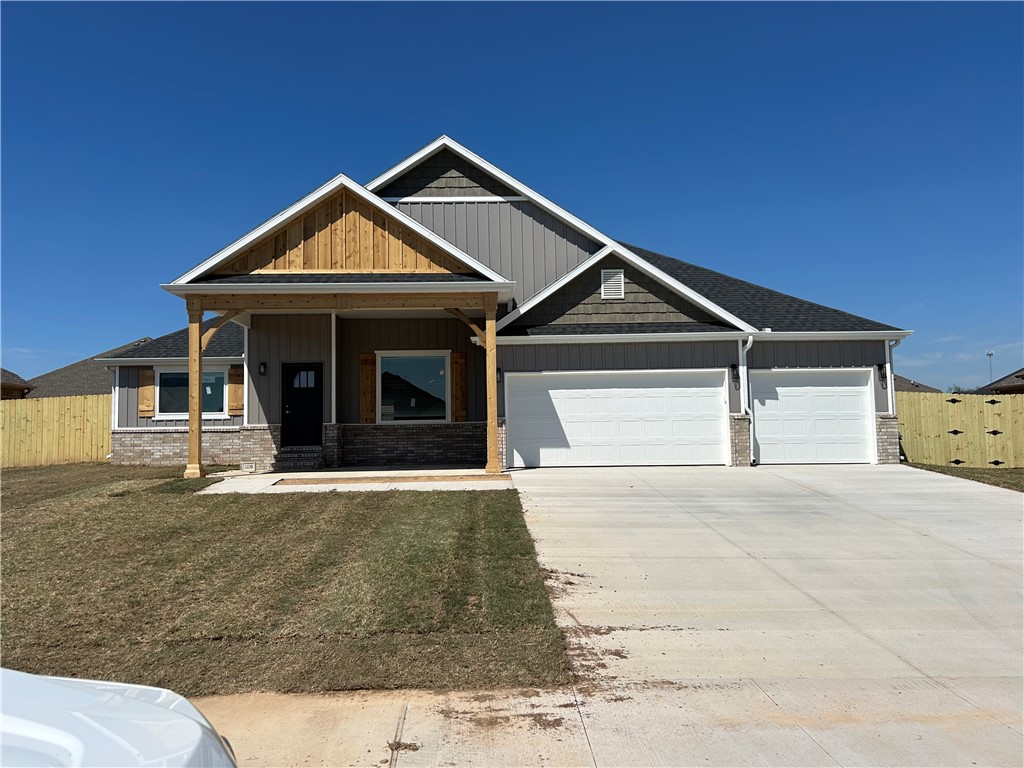 Stunning new construction—this single-story home features 3 bedrooms, 2 bathrooms, and a spacious 3 car garage. The kitchen is equipped with stainless steel appliances, a gas range, microwave vent hood, pantry, and granite countertops. A large fireplace flanked with built-in bookshelves serves as a striking centerpiece in the living room. Elegant details include wood-cased windows with 2-inch blinds throughout. Enjoy great curb appeal with a large front porch, fully sodded oversized yard, and a privacy fence. The covered back porch and fully installed gutters add both comfort and functionality.  The primary suite boasts an oversized tiled shower and a walk-in closet that connects directly to the laundry room, located near the garage for added convenience. Photos are of similar plan, interior photos may vary.  Seller will pay $2,500 in buyer concessions.  $5,000 credit available with preferred lender.