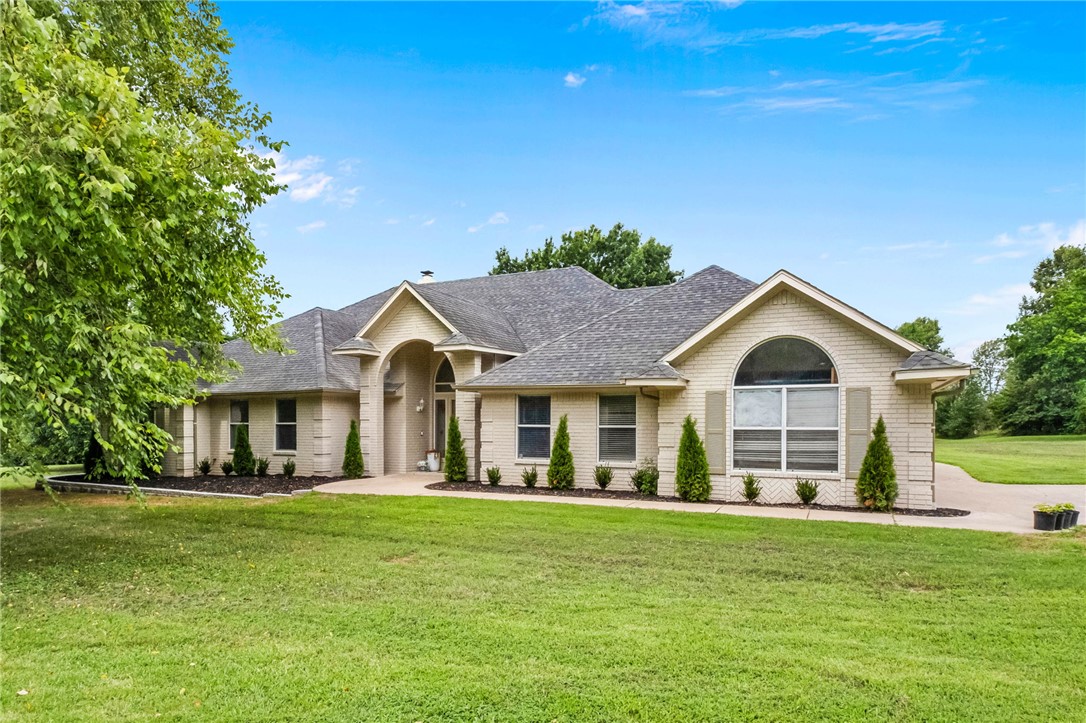 Welcome to 4890 Butterfield Coach Road, a completely remodeled 3,503-square-foot home situated on 3.86 private acres in Springdale. This property offers the perfect combination of updated living, privacy, and convenience, located just down the road from the new Woodland Middle School and only minutes from Fayetteville with easy access to the Joyce Boulevard corridor. The home has been extensively remodeled, creating a fresh, move-in-ready feel with plenty of room to spread out. Outside, mature trees and expansive acreage provide a peaceful setting with flexibility for outdoor living, recreation, or future improvements. A separate shop offers excellent space for storage, hobbies, equipment, or a home-based business. The property also features an existing in-ground pool that is currently empty and will need to be restored. With a fully updated home, nearly four acres, a bonus room, a shop, and a convenient location this one-of-a-kind property is packed with possibilities.