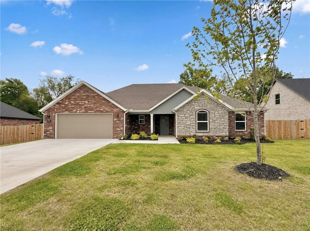 Welcome to Deere Creek in Springdale/Elm Springs! This beautiful Kennedy Plan offers 4 bedrooms, 3 full bathrooms, and 1,989 square feet of thoughtfully designed living space.

Inside, you’ll find granite countertops, custom cabinetry, a spacious pantry, and an inviting open layout centered around a cozy gas fireplace. The private primary suite features a tray ceiling and a spa-like bath with a soaking tub and separate shower. Large secondary bedrooms provide plenty of space, while the oversized 4th bedroom with an adjacent bath is perfect for guests or a bonus space.

Additional highlights include double sinks in the third bathroom, a large laundry room, and a covered back patio ideal for relaxing or entertaining. Residents enjoy neighborhood walking trails and a welcoming community atmosphere.

With stylish finishes, functional design, and a great location, this Deere Creek home is one you won’t want to miss. Schedule your self-tour today!