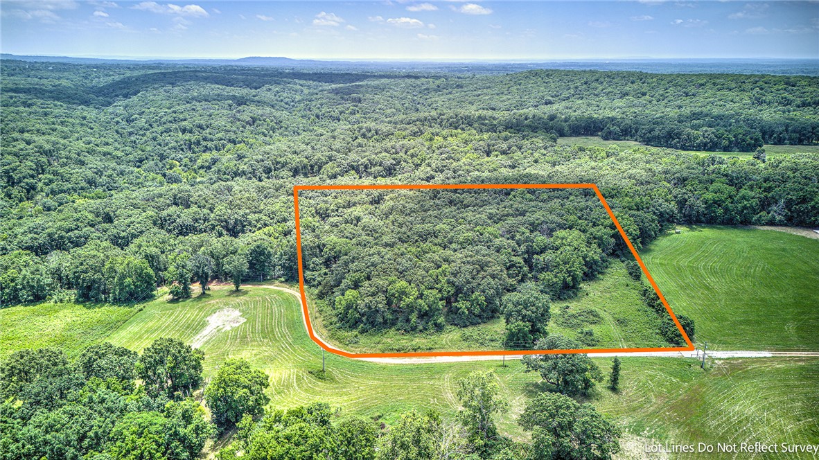 Escape the ordinary on 7.92 acres bordering Pea Ridge National Military Park. Hidden away on a private drive, this one-of-a-kind property offers the privacy you've been searching for, with wildlife roaming freely and protected parkland creating a breathtaking backdrop. Whether you dream of building, investing, or simply owning a piece of nature, this rare acreage delivers space, serenity, and a setting that can't be replicated.