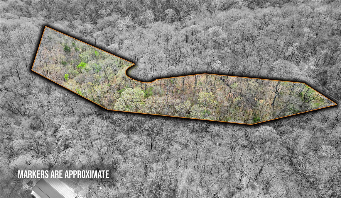 Discover the perfect setting to escape the city and build your dream home on two parcels totaling 2.22 acres in the Lost Bridge Community HOA! Tucked back off the road, the property offers a great sense of privacy and a peaceful setting surrounded by nature. Whether you’re thinking of a weekend getaway or a full-time home, there’s plenty of space here to build something special. Located in the Lost Bridge Community POA, you’ll be close to Beaver Lake and all the outdoor fun that comes with it - boating, fishing, and relaxing by the water. The property backs up to 138 acres of common property that lost bridge village owns. That property is for people who live in the village to use for hiking and hunting (Bow only). It is an available amenity that you can access right from the property!  If you’ve been waiting for the right piece of land to build on, this could be it!
