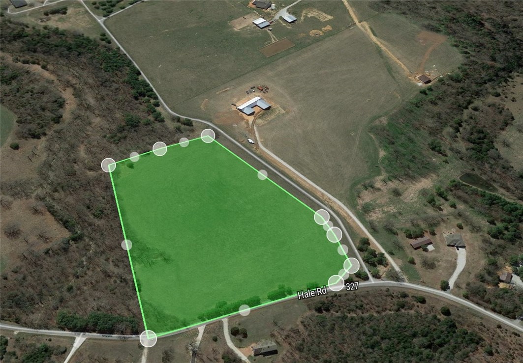 Beautiful level pasture ready to build dream your home. City water at street, valley mountain views all around, blacktop road frontage, with lots of large pines along road. Great place for horses.