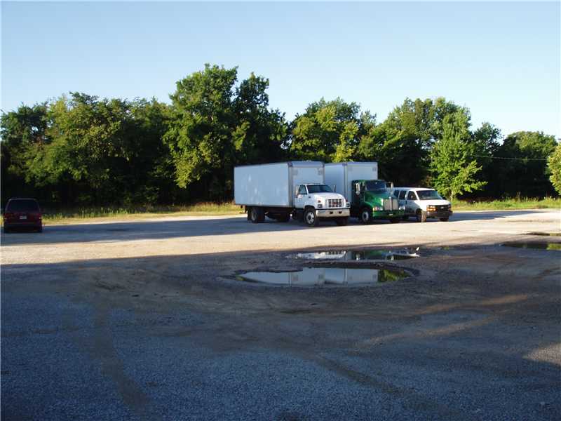 Excellent re-development opportunity. Property is located on a busy corner lot and is zoned I-2. Site consists of 2.68 acres MOL. New housing development being built across the street. Property has an existing 1680 square foot structure formally used for commmercial office and limited food service. The existing building could be renovated but value is the land.