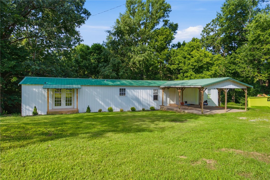 Beautifully renovated and move-in ready home near the lake. Perched in a peaceful setting with beautiful lake views, this home has been thoughtfully remodeled from top to bottom, creating a fresh, inviting space that’s ready for its new owner. Whether you’re searching for a weekend getaway, a full-time residence, or an investment property, this home delivers. Enjoy your morning coffee overlooking the lake, spend the day exploring nearby Beaver Lake, and come home to a cozy retreat designed for easy living. With its updated finishes, efficient layout, and unbeatable location, this property offers the best of Northwest Arkansas lake life. Don’t miss your chance to own a fully renovated home with lake views at an affordable price!