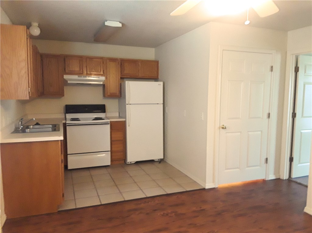 Great Fayetteville apartment located just minutes from shopping, restaurants, walking trail and university. Vinyl plank in living room, carpet in bedroom. Full-sized refrigerator, range, garbage disposal. Stackable washer/dryer. Walk-in closet. Shower/tub combo. Upstairs unit in 6-plex. All electric unit. Tenant pays electric only. Water/trash included in rent.  Tenant occupied.