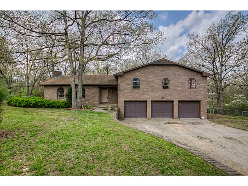 SPACIOUS 5BD/2.5BA HOME LOCATED ON LARGE TREE STUDDED 3.35 ACRE LOT. STONE WALL THROUGHOUT LIVING ROOM, KITCHEN HAS BRAND NEW BEAUTIFUL GRANITE COUNTER TOPS,  AN ABUNDANCE OF CABINET SPACE AND MANY BUILT INS, DECK CAN BE,ACCESSED FROM DINING ROOM. MASTER BEDROOM ALSO HAS ACCESS TO BACK DECK. HOME HAS TILE AND CARPET THROUGHOUT.