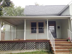 Large 4 bedroom home with beautiful hardwood floors. Several updates inside including kitchen cabinets and windows. Two car garage. Great Value!