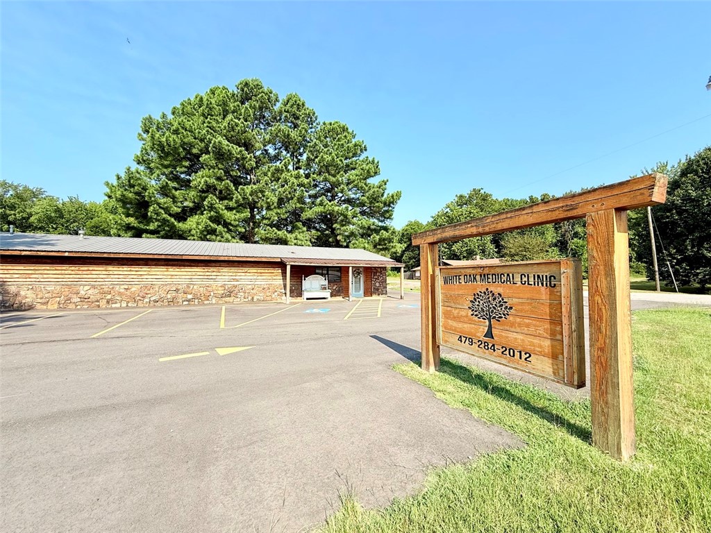 Prime Commercial Opportunity in the Heart of Hector. Located in the center of town and across from Hector School, the Medical Clinic offers a rare opportunity to own a fully operational medical office, or repurpose the space to fit your unique vision. This versatile property is for sale, and medical equipment can be included with the purchase. The building also has potential for residential use as well. Step inside to a spacious waiting area and receptionist window that welcomes patients and guests. The receptionist office is generously sized, and the layout includes five dedicated patient rooms, a smaller multi-use room, and an additional waiting area. Two restrooms are located in the back, along with a kitchen area for staff use. The building also features a large private office with two closets for storage and direct access to the outside—perfect for privacy and convenience. This property is also possibly available for lease at $2,800/month, offering an excellent rental opportunity in a high-visibility location.