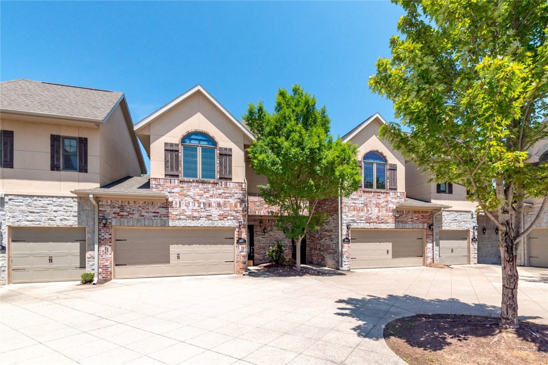 Two bedroom luxury condo in the heart of NWA. This condo comes with a spiral staircase, large patio, walk-in closets, open floor plan, and two car garage. Each bedroom has it's own Full bath with a 1/2 bath downstairs.