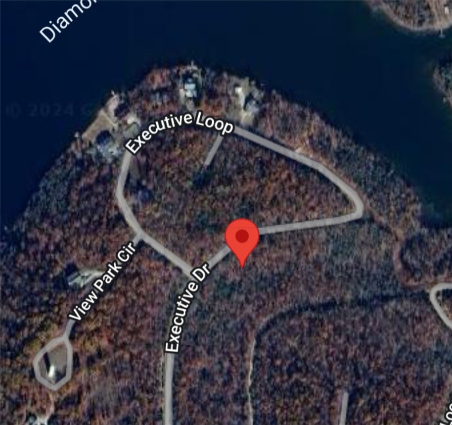 This is a spacious .38(+/-) acre lot in Horseshoe Bend of Izard County. It is only a couple blocks from Diamond Lake and only minutes from Crown and Pioneer Lakes. Build your new home and enjoy the lake life and being close to local amenities. Manufactured homes are not allowed. Owner financing available.