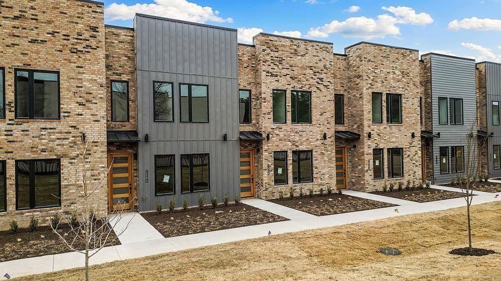 Experience sophisticated, low-maintenance living in this stunning newly constructed townhome in one of Rogers' most convenient locations near Scottsdale Center! Offering over 2,100 square feet of thoughtfully designed living space, this beautiful townhome features 3 spacious bedrooms, 2.5 baths, plus a private office—perfect for today's work-from-home lifestyle. The open-concept floor plan is filled with natural light and seamlessly connects the living, dining, and kitchen areas. Stylish finishes, soaring ceilings, and quality craftsmanship provide a fresh, modern feel throughout.  Ideally located just minutes from shopping, dining, parks, schools, and major employers, this exceptional townhome combines modern design, convenience, and everyday comfort in one beautiful package!