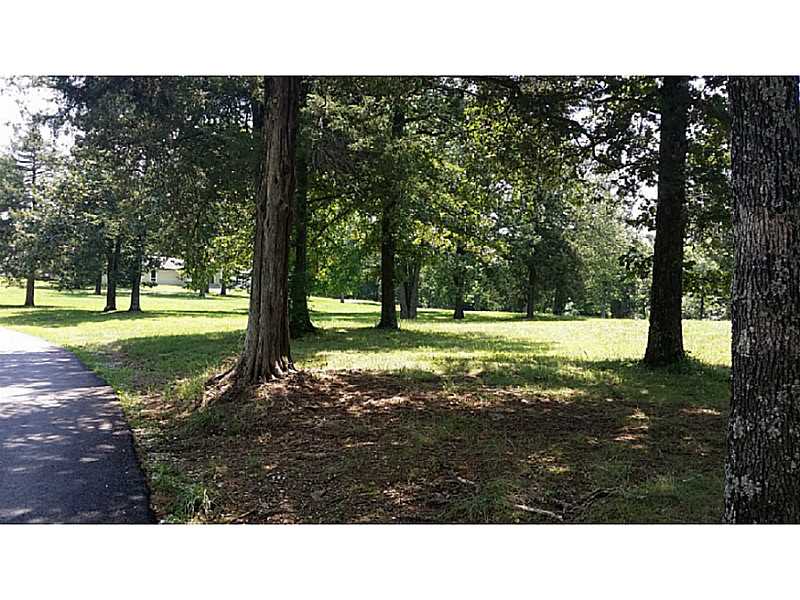 Beautiful piece of land; a terrific place to build a dream home. This 3 acre lot has open areas with mature trees and a creek running along side boundary, starting at the west, going to the south side of the property. Nearby homes are absolutely a bonus!