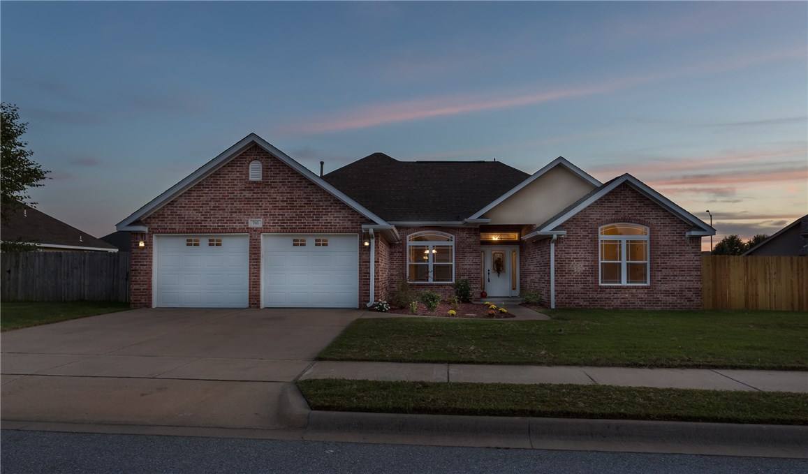 Beautifully maintained 4 bedroom, 2 bath home in a great subdivision! Brick & stucco exterior, 2018sf of living area with spacious rooms. Formal dining area, breakfast nook, gas fp in the LR. Master suite has his/her sinks, Jacuzzi tub & shower w/walk-in closet. Covered back porch gives great shade to those evening BBQ's while watching the kids play in your wood privacy fenced yard. 2 car garage. Located on the east side of town, very accessible to Hwy 412 for easy commute to anywhere on the I49 corridor.
