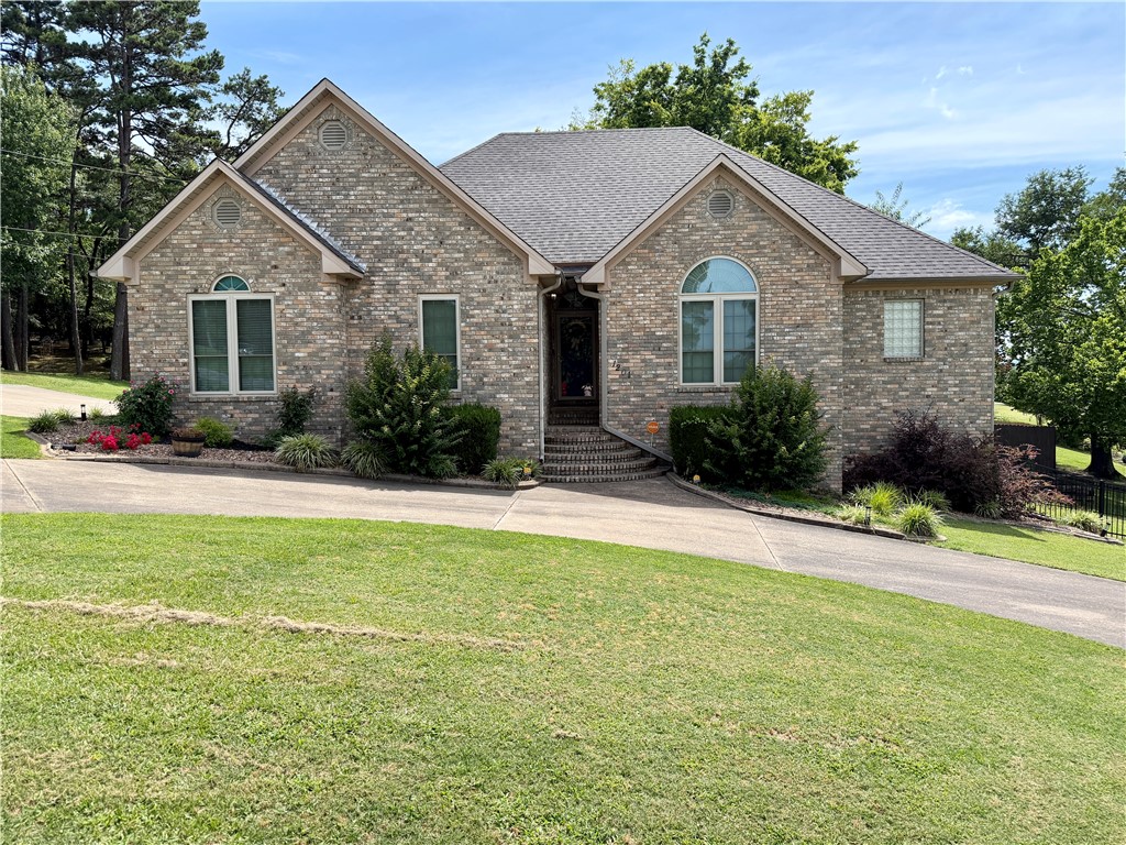 Beautifully maintained brick home with ample space inside & out, perfect for the family living & entertaining. Enjoy peaceful views from your multi-level deck, day or night. This home offers a spacious master bedroom with a sitting area, a large walk-in closet, & a private deck. A second bedroom features it's own private full bathroom. The large living room with a fireplace creates a warm & inviting atmosphere for cozy winter nights. Step down to the lower 636 sqft level ideal for a 3rd bedroom, playroom, or flex space complete with a 1/2 bath & "safe room", plus access to the fenced side yard. Enjoy the convenience of a temperature-controlled craw space for added storage. For the outdoor enthusiasts or hobbyists, the 2 bay shop with covered rv port is perfect for storing your camper, atv's, boats, or other equipment. Located just minutes from schools, shopping, restaurants, & I40. Embrace country living with all the city convenience. Call today to schedule your private tour & make this HOME your next destination.