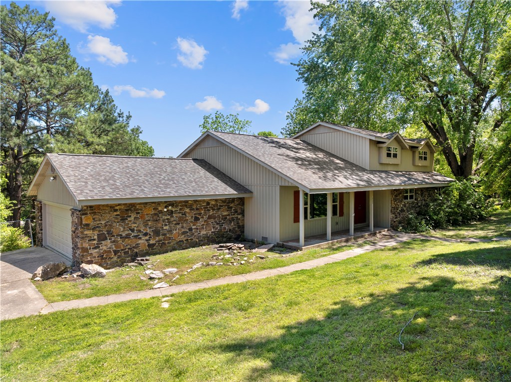 This extensively updated 5-bedroom home feels practically brand new! Updates include new siding, paint, flooring, cabinets, countertops, appliances, roof, windows, and deck.

The layout offers flexibility with two bedrooms on the main floor, including a spacious primary suite with a fantastic en suite bath. You’ll also love the oversized laundry room.

Designed for entertaining, the kitchen features bar-top seating overlooking the family room, plus there is a separate living room for additional space to relax or gather. The large back deck is perfect for hosting guests or enjoying the outdoors.

Compared to current new construction costs averaging around $220 per square foot, a similar home could approach $650,000. This property offers exceptional value at approximately $160 per square foot. Conveniently located close to shopping, dining, schools, and everyday amenities while still tucked away from heavy traffic.

Look fast. This one won't last long!