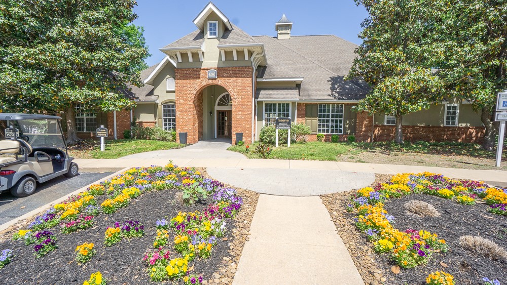 Turnkey 2BR/2BA condo in The Reserve at Steele Crossing, one of Northwest Arkansas’s premier condo communities west of the NWA Mall. Freshly updated with new paint, new carpet, and stainless steel appliances. Hardwood flooring in main living and dining areas creates a warm, modern feel. Enjoy a private covered balcony overlooking the resort-style pool. Highly desirable one-car garage plus extra storage behind garage and additional balcony storage closet. Direct access to the NWA Greenway Trail. Community amenities include clubhouse with fitness center and billiards room, 30-acre grounds with swimming pool, basketball court, and on-site dog park. Pet-friendly, low-maintenance living in a prime location near shopping, dining, and entertainment.