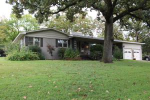 Excellent location in West Russellville with tons of updates!! You are going to love the living space in this home both inside and out. Great for entertaining or relaxing with open living to kitchen space as well as finished out covered space out back for games and grilling out! Remodeled kitchen with updated appliances, all new vinyl double pane windows tons of built ins and loads of storage throughout this home.