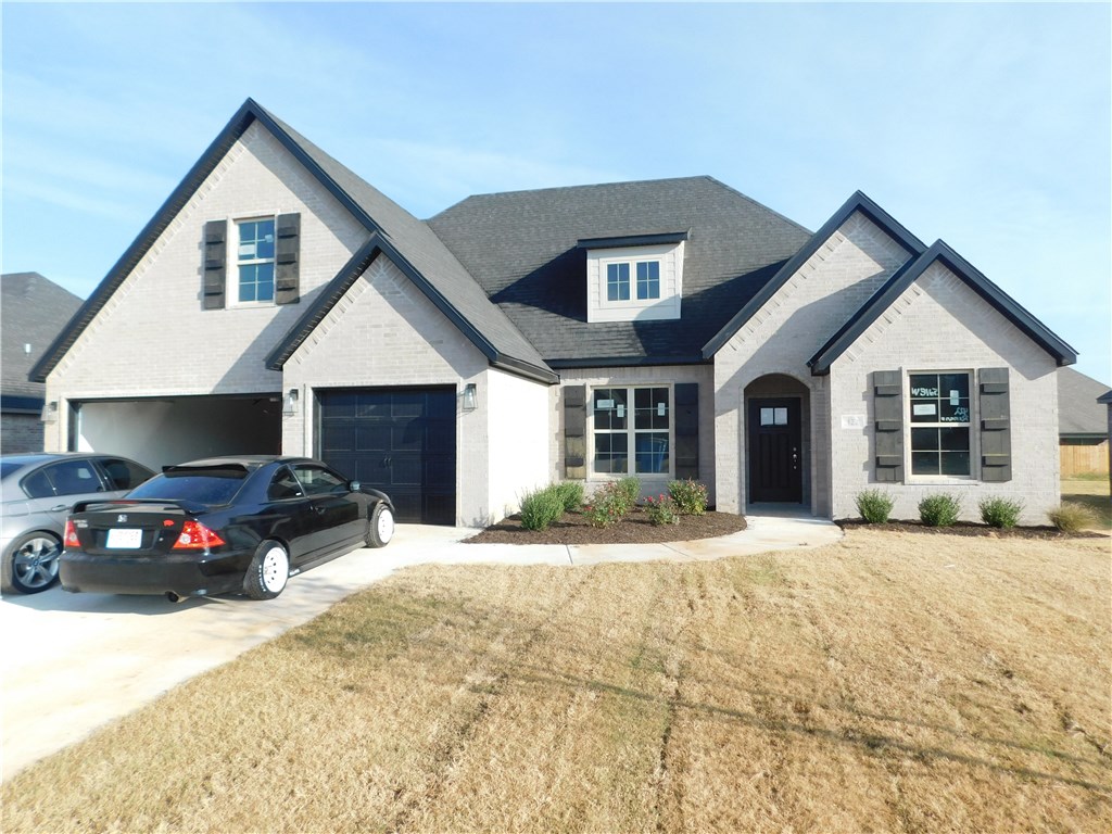 Beautiful new home features 2,345 sq ft, 4 BR, 3 BA, 3 car GR, wood floors, covered patio, & open floor plan for entertaining. The wood beams on the ceiling provide an extra touch to the living area. The kitchen features a farm sink, granite, under mount counter lighting, gas cook top, vent hood, & stainless steel appliances. The master suite boasts crown molding, walk-thru closet to the laundry room, walk-in tile shower, & double sinks. Nice community pool and easy access to I-49, Hwy 412 & Hwy 112.