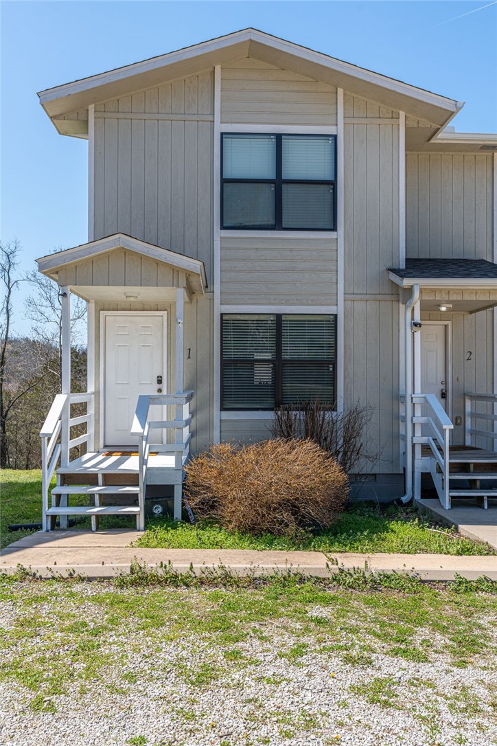This 2-bedroom, 1.5-bathroom condo overlooks the pristine waters of Table Rock Lake. The main level offers living and dining areas, complete with a convenient half-bath for guests. From the kitchen step out onto the first of two private decks to enjoy refreshing breezes and the ultimate spot for morning coffee with views of the lake. The upper level features two bedrooms, including a primary with its own exclusive second-story deck. As part of Holiday Island, enjoy a wealth of amenities that enhance the living experience including two pools, tennis/pickleball courts, and two golf courses 
Whether you're seeking a full-time residence or a weekend getaway, this condo combines the best of Holiday Island & Table Rock Lake living! New roof 2025 and new decks 2026. Sold with all furnishings and appliances!