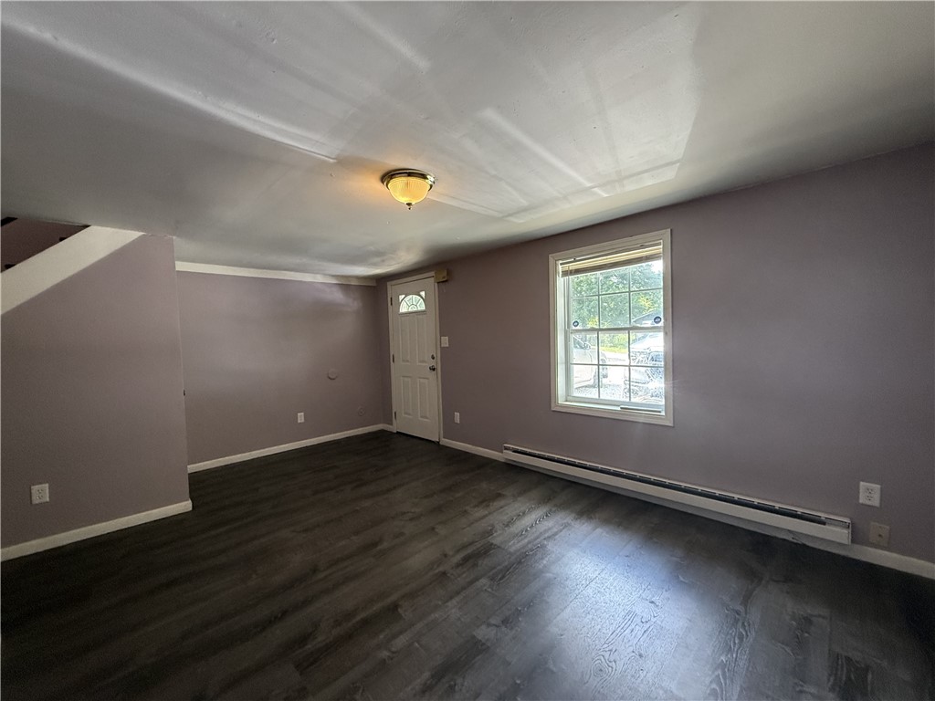1 Bedroom, 1 bath with washer/dryer connections in the unit.  This is a TWO level unit.  Livingroom & kitchen on the main level, upstairs is bathroom with washer/dryer connections, bedroom and storage room or office.