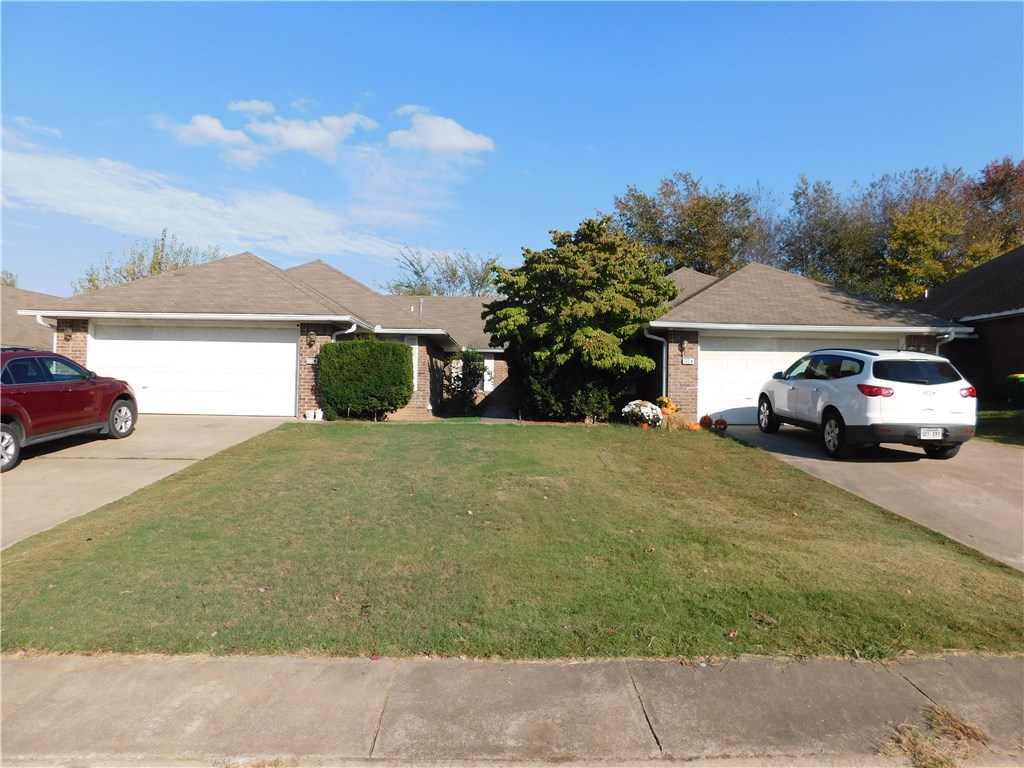 Spacious 3 Bedroom, 2 Bath, and 2 Car Garage on each side of duplex, nice backyard, quiet street and easy access to I-49. Brick duplex, functional design for living, and well maintained.