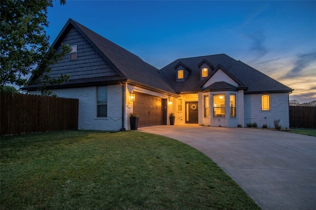 BENTONVILLE SCHOOLS! This beautifully updated 3-bedroom, 2.5-bath home features a dedicated office plus a spacious bonus room, offering flexible living for work, play, or guests. Ideally located between XNA and Pinnacle Hills Promenade on a large cul-de-sac corner lot, this home offers a huge backyard in a quiet, family-friendly neighborhood. Recent upgrades include an Italian lime-washed exterior brick, a remodeled kitchen with quartz countertops, designer backsplash, and a stainless steel sink with Brass Kohler kitchen faucet with in-counter soap dispenser, water filtration directly from faucet, plus stunning landscaping and a new fireplace surround. Enjoy an oversized garage, electric range with air fryer option (gas hookup available), and washer, dryer, and refrigerator that all convey. Additional features include a UV air filtration system, VOC-free paint, 5-year-old HVAC, and countless thoughtful updates throughout. This one is truly a must-see!
