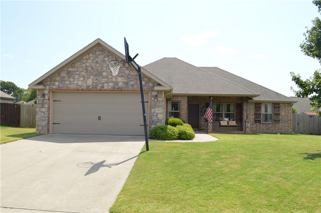 This is a beautiful and immaculate 4 bedroom brick home located next to everything Prairie Grove has to offer.  This home has granite countertops, 2 car garage, gas fireplace, carpet and hardwood floors.  The AC sytem was recently purchased, landscaped front yard and fenced backyard. Located near water park, schools, downtown shopping district and State Park.  This home features a 12ft arched entryway, crown moldings, walk-in closet, jacuzzi tub, tilt wash windows, attic storage, and covered back patio.  Seller is willing to pay up to $5000.00 of Buyers closing cost with acceptable offer.