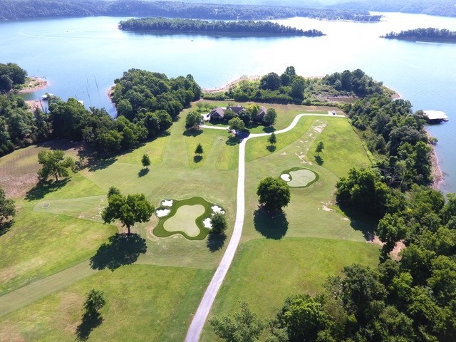Waterfront Estate on Beaver Lake complete with it's own 9 hole golf course, private boat dock with 8 slips/2 lifts, 3K sq ft outbuilding, on a private cove. Close to Horseshoe Bend; above garage media room/private guest room, great outdoor entertaining area. Very private/gated. Sold with most furnishings. Call listing agent for details.