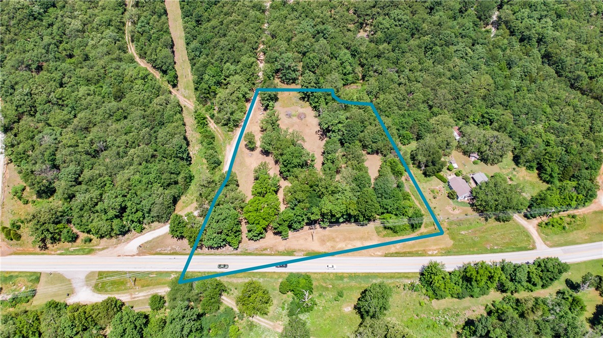 Build Your Dream Home here!  3 Acres with new Survey.  Municipal water and Natural Gas available.  Park like setting with Mature Hardwoods.  Relax and enjoy the Countryside setting!  Call listing agent for more information