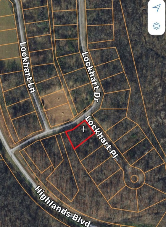 Build your dream home here! Gorgeous tree covered 0.29 acre corner lot in the quiet Lockhart Neighborhood of Bella Vista. Perfect for outdoor enthusiasts, this property is within 6 miles to Lake Loch Lomond marina, boat launches, Bella Vista K9 Corral Dog Park and the Scotsdale Golf Course. You’re also less than 1 mile to the new Bella Vista Bypass, providing a quick 15 minute drive to Downtown Bentonville, Crystal Bridges, Amazeum, and some of the best restaurants and retail.  NOTE:  Lot did not pass perc test.  Consider purchase in combination with an adjoining lot.