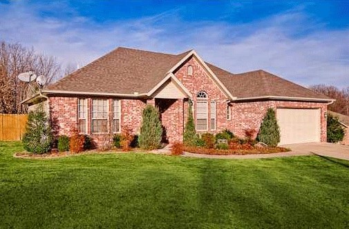Beautiful 3BR/2BA home situated on a quiet cul-de-sac only 3 miles from the Lake Bella Vista walking trail.  Enjoy nature and entertaining in this home with a large backyard, backed by mature trees, with exquisite landscaping, a large deck, and a fire pit! Split floor plan with wood floors in the living and dining room.  Beautiful cabinetry and granite in kitchen.  Large master bath with whirlpool tub and 2 walk in closets. Fully insulated garage.  House includes an adjacent flat lot.  Great location!