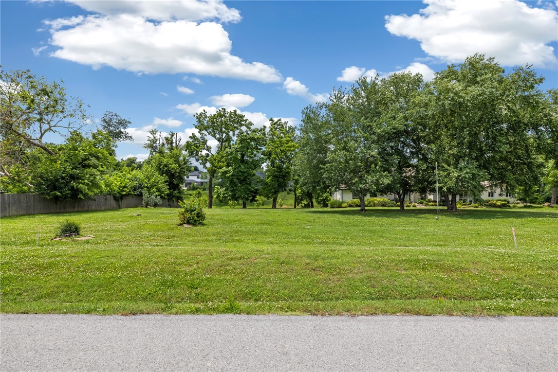 This is the Downtown Bentonville lot you've been waiting for!   Prime location near schools, parks, trails and an easy walk to the Downtown Bentonville Square!  Fantastic opportunity not to be missed!