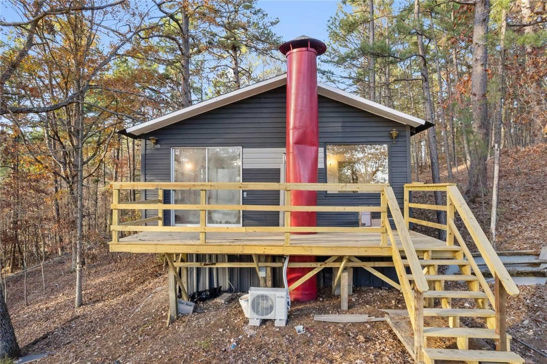 Fantastic little piece of heaven near the lake. Three minutes from a boat ramp just down the road. Entire house was renovated, new electrical, new plumbing, new floors, new cabinets, new granite countertop , new deck and area to entertain in the back yard. Peaceful area secluded and surrounded by nature. Perfect for an airbnb. Four brand new high efficient mini splits where you can control your preferred temperature in separate rooms. This property was originally a mobile home with an addition now on a permanent foundation. Also shared well with agreement in place.