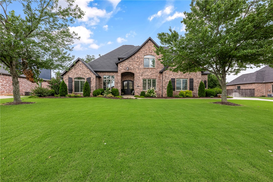 Discover your dream of private, serene living in this breathtaking home with an outdoor oasis. Perfect for relaxation, entertaining, or enjoying activities like frisbee and hammock swinging. Inside, find welcoming open spaces with a stylish design. This five-bedroom home features three bedrooms on the main level, plus two upstairs alongside a spacious bonus room and media room. Enjoy a formal office, dining room, or versatile flex space on the main level. Large windows bathe the home in natural light, showcasing the beautiful outdoor views. Truly a must-see! With community pool and clubhouse, this home truly has it all!!