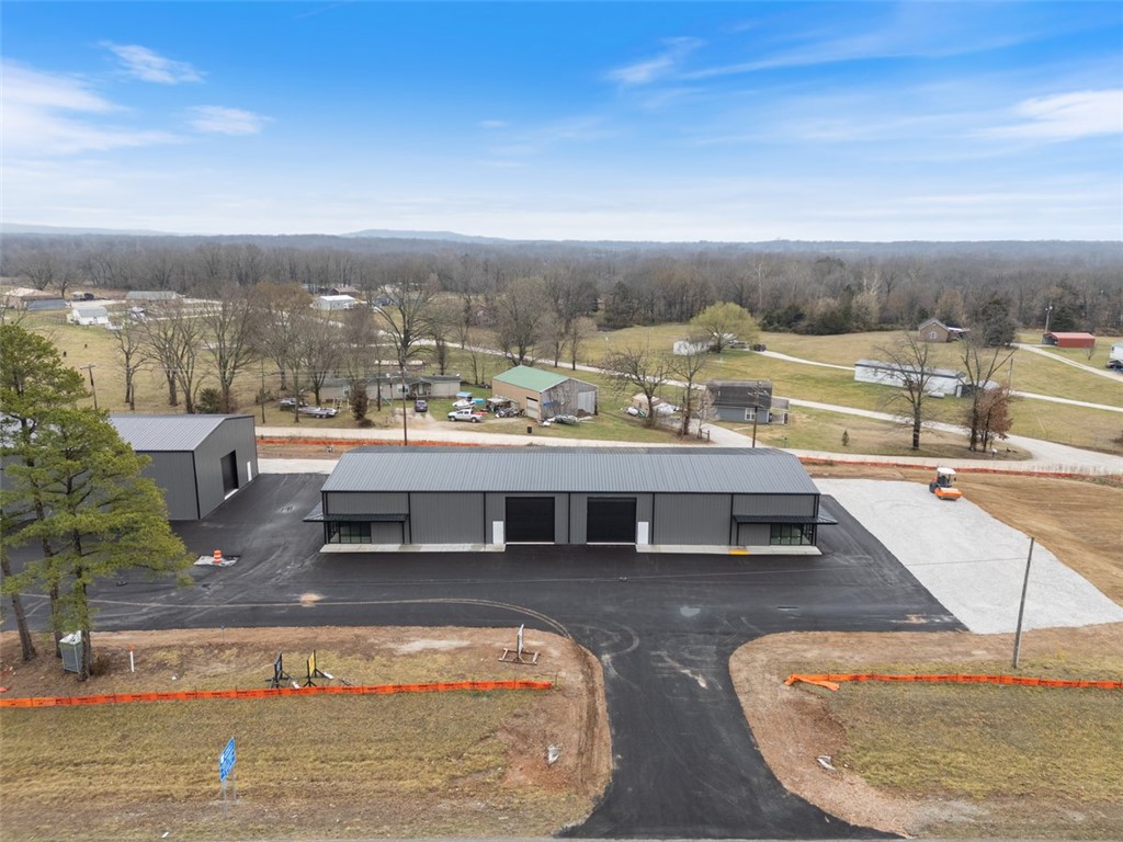 New Construction flex space along Hwy 62 in Garfield Ar. Major road frontage with almost 30,000 vpd. Please call your agent today to schedule your tour.