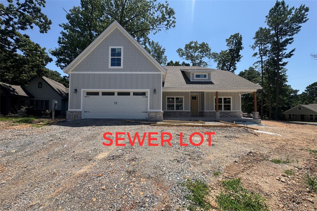 Located on a SEWER lot!! Completion date of 8/25! Experience the perfect blend of style and comfort in this beautifully crafted new construction home, situated on a spacious 0.30-acre CORNER lot just minutes from Lake Norwood. Offering 4 bedrooms and 3 full bathrooms, this thoughtfully designed home welcomes you with an open living area featuring vaulted ceilings and LVP flooring throughout (NO CARPET). The kitchen is equipped with quartz countertops, a generous island, custom cabinetry with a decorative vent hood, gas range, stainless steel appliances, and walk-in pantry. Unwind in the luxurious primary suite, where the spa-like bathroom includes a soaking tub, an expansive walk-in shower, dual vanities, and a large walk-in closet. Spend your mornings on the covered front porch or relax on the covered back patio overlooking the spacious backyard. Blinds and gutters included. Don't miss your chance to own this stunning home in a thriving, growing community! Photos are not of exact home/finishes!