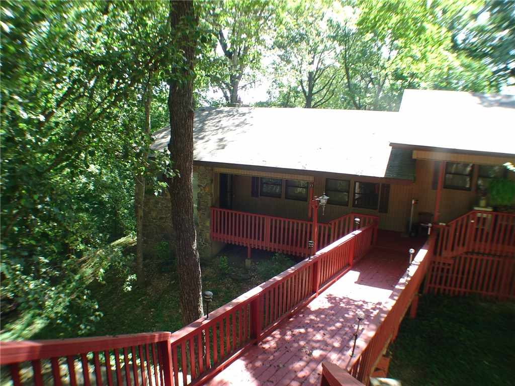 Year-round golf view in this end unit townhome. All one level! Covered carport plus two additional parking spaces. Fresh paint in interior and on decks. New patio doors, new carpet and vinyl. New blinds. Washer and dryer included.